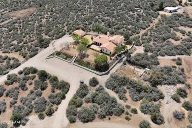Discover a rare fusion of old-world elegance & cutting-edge on StoneRidge Golf Course in Arizona - for sale on GolfHomes.com, golf home, golf lot