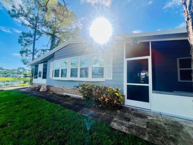 Welcome to this spacious 2-bedroom, 2-bath home located gated on Lake Fairways Country Club in Florida - for sale on GolfHomes.com, golf home, golf lot
