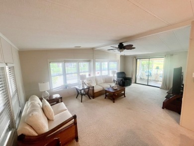 Welcome to this spacious 2-bedroom, 2-bath home located gated on Lake Fairways Country Club in Florida - for sale on GolfHomes.com, golf home, golf lot
