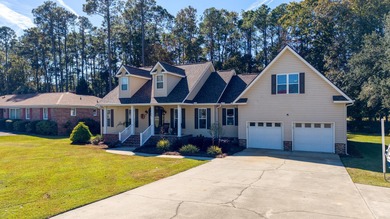 Enjoy life by the lake in this beautiful home located on the on Santee-Cooper Country Club in South Carolina - for sale on GolfHomes.com, golf home, golf lot