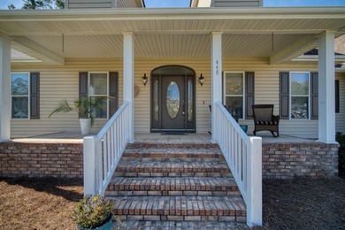 Enjoy life by the lake in this beautiful home located on the on Santee-Cooper Country Club in South Carolina - for sale on GolfHomes.com, golf home, golf lot