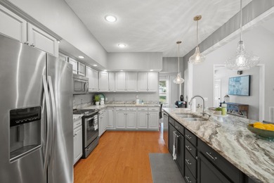 Enjoy life by the lake in this beautiful home located on the on Santee-Cooper Country Club in South Carolina - for sale on GolfHomes.com, golf home, golf lot