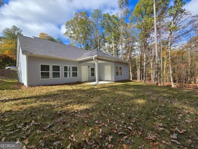 Discover the charm of modern living in Villa Rica with this on Fairfield Plantation Golf and Country Club in Georgia - for sale on GolfHomes.com, golf home, golf lot