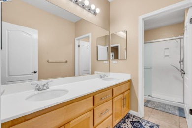 Discover refined living in this stunning 5-bedroom, 4.5-bath on Shadow Lakes Golf Club in California - for sale on GolfHomes.com, golf home, golf lot