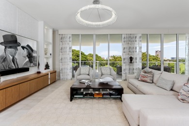 Immersed in verdant, canopied landscaping, offering panoramic on Boca Raton Resort and Club in Florida - for sale on GolfHomes.com, golf home, golf lot