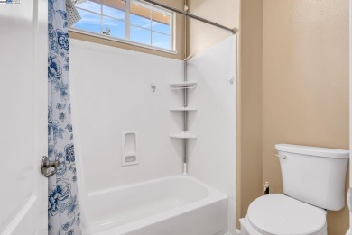 Discover refined living in this stunning 5-bedroom, 4.5-bath on Shadow Lakes Golf Club in California - for sale on GolfHomes.com, golf home, golf lot
