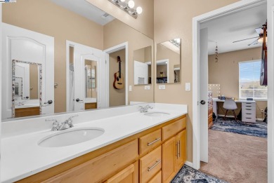 Discover refined living in this stunning 5-bedroom, 4.5-bath on Shadow Lakes Golf Club in California - for sale on GolfHomes.com, golf home, golf lot