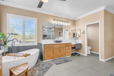 Discover refined living in this stunning 5-bedroom, 4.5-bath on Shadow Lakes Golf Club in California - for sale on GolfHomes.com, golf home, golf lot