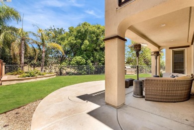 Discover refined living in this stunning 5-bedroom, 4.5-bath on Shadow Lakes Golf Club in California - for sale on GolfHomes.com, golf home, golf lot