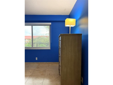 Welcome to 1001 SW 128 Ter #B407! This bright, spacious condo on Flamingo Lakes Country Club in Florida - for sale on GolfHomes.com, golf home, golf lot