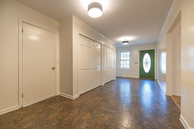 Set on a generous lot with wooded surroundings and views of the on The Founders Club At Pawleys Island in South Carolina - for sale on GolfHomes.com, golf home, golf lot