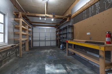 Set on a generous lot with wooded surroundings and views of the on The Founders Club At Pawleys Island in South Carolina - for sale on GolfHomes.com, golf home, golf lot