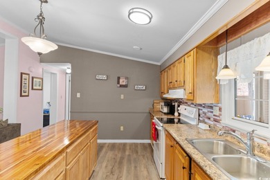 Tucked inside the sought-after 55+ community of Ocean Pines on Indigo Creek Golf Club in South Carolina - for sale on GolfHomes.com, golf home, golf lot