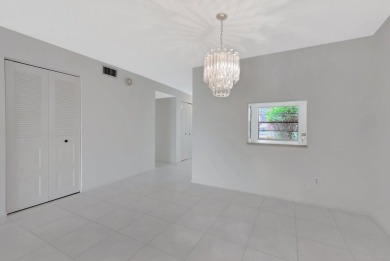 Welcome to this spacious 2 BD - 2 BA, First floor condo with on Boca Lago Golf and Country Club in Florida - for sale on GolfHomes.com, golf home, golf lot