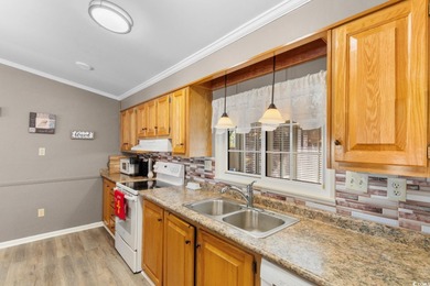 Tucked inside the sought-after 55+ community of Ocean Pines on Indigo Creek Golf Club in South Carolina - for sale on GolfHomes.com, golf home, golf lot