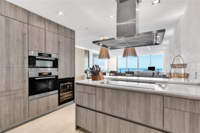 Gorgeous finely finished flow-through unit at the exclusive on Crandon Golf At Key Biscayne in Florida - for sale on GolfHomes.com, golf home, golf lot