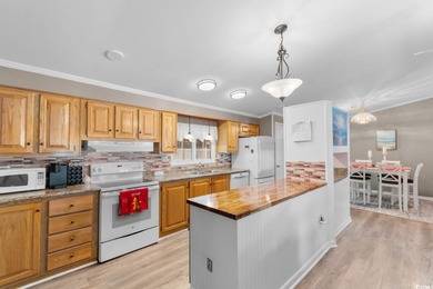 Tucked inside the sought-after 55+ community of Ocean Pines on Indigo Creek Golf Club in South Carolina - for sale on GolfHomes.com, golf home, golf lot