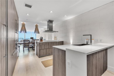 Gorgeous finely finished flow-through unit at the exclusive on Crandon Golf At Key Biscayne in Florida - for sale on GolfHomes.com, golf home, golf lot