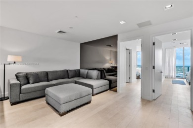 Gorgeous finely finished flow-through unit at the exclusive on Crandon Golf At Key Biscayne in Florida - for sale on GolfHomes.com, golf home, golf lot