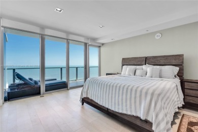 Gorgeous finely finished flow-through unit at the exclusive on Crandon Golf At Key Biscayne in Florida - for sale on GolfHomes.com, golf home, golf lot