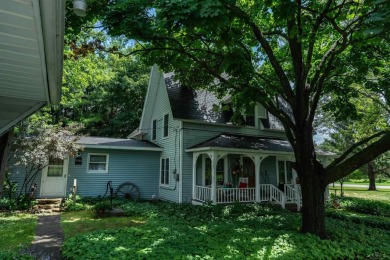 Discover the timeless charm of 9980 Tittabawassee, a historic on Golf Club At Apple Mountain in Michigan - for sale on GolfHomes.com, golf home, golf lot