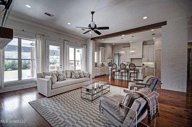 Stunning home on the golf course in sought after Lake Caroline! on Lake Caroline Golf Club in Mississippi - for sale on GolfHomes.com, golf home, golf lot