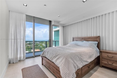 Gorgeous finely finished flow-through unit at the exclusive on Crandon Golf At Key Biscayne in Florida - for sale on GolfHomes.com, golf home, golf lot