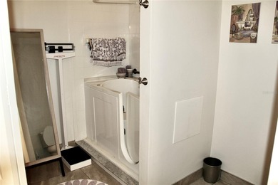 This immaculate 2 bedroom 2 bath home is nestled in behind the on Halifax Plantation Golf Club in Florida - for sale on GolfHomes.com, golf home, golf lot