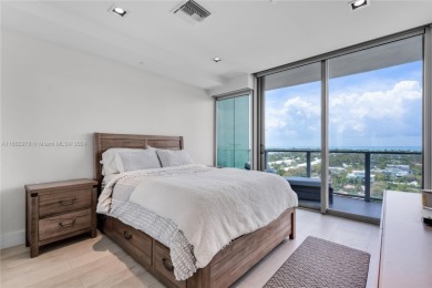 Gorgeous finely finished flow-through unit at the exclusive on Crandon Golf At Key Biscayne in Florida - for sale on GolfHomes.com, golf home, golf lot