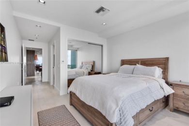 Gorgeous finely finished flow-through unit at the exclusive on Crandon Golf At Key Biscayne in Florida - for sale on GolfHomes.com, golf home, golf lot