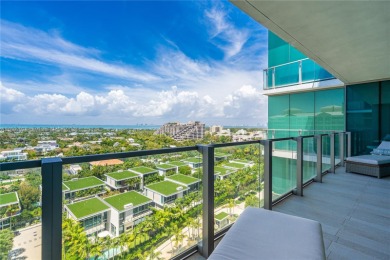 Gorgeous finely finished flow-through unit at the exclusive on Crandon Golf At Key Biscayne in Florida - for sale on GolfHomes.com, golf home, golf lot