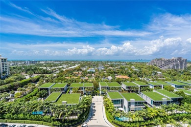 Gorgeous finely finished flow-through unit at the exclusive on Crandon Golf At Key Biscayne in Florida - for sale on GolfHomes.com, golf home, golf lot