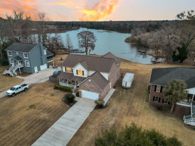 Welcome to this 4 bed 2.5 bath home in one of the most sought on Berkeley Country Club in South Carolina - for sale on GolfHomes.com, golf home, golf lot