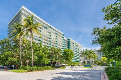 Gorgeous finely finished flow-through unit at the exclusive on Crandon Golf At Key Biscayne in Florida - for sale on GolfHomes.com, golf home, golf lot