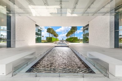 Gorgeous finely finished flow-through unit at the exclusive on Crandon Golf At Key Biscayne in Florida - for sale on GolfHomes.com, golf home, golf lot