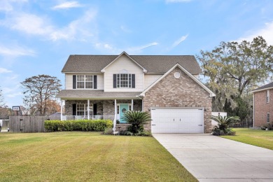 Welcome to this 4 bed 2.5 bath home in one of the most sought on Berkeley Country Club in South Carolina - for sale on GolfHomes.com, golf home, golf lot