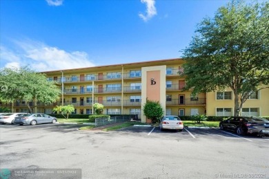 THIS 55+ 3RD FLOOR CORNER UNIT IN CENTURY VILLAGE HAS LAKE AND on Grand Palms Hotel and Golf Resort in Florida - for sale on GolfHomes.com, golf home, golf lot