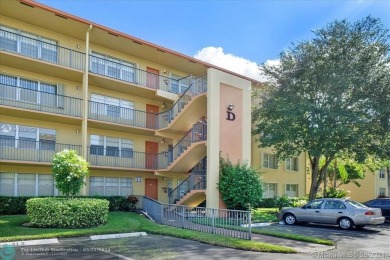 THIS 55+ 3RD FLOOR CORNER UNIT IN CENTURY VILLAGE HAS LAKE AND on Grand Palms Hotel and Golf Resort in Florida - for sale on GolfHomes.com, golf home, golf lot