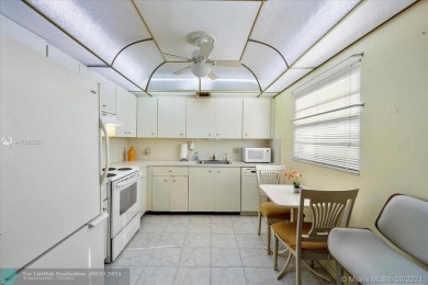 THIS 55+ 3RD FLOOR CORNER UNIT IN CENTURY VILLAGE HAS LAKE AND on Grand Palms Hotel and Golf Resort in Florida - for sale on GolfHomes.com, golf home, golf lot