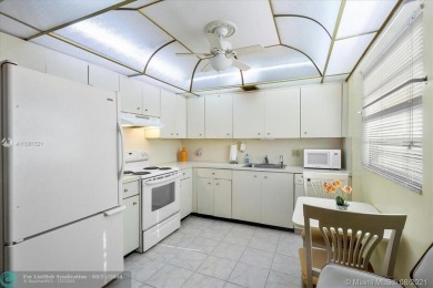 THIS 55+ 3RD FLOOR CORNER UNIT IN CENTURY VILLAGE HAS LAKE AND on Grand Palms Hotel and Golf Resort in Florida - for sale on GolfHomes.com, golf home, golf lot