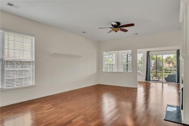 Enjoy Fabulous lagoon views from your large covered screen on Hidden Cypress Golf Club in South Carolina - for sale on GolfHomes.com, golf home, golf lot
