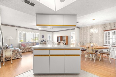 Welcome home to this immaculately maintained and sparkling clean on The Links of Spruce Creek in Florida - for sale on GolfHomes.com, golf home, golf lot