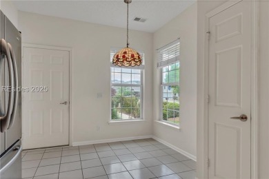 Enjoy Fabulous lagoon views from your large covered screen on Hidden Cypress Golf Club in South Carolina - for sale on GolfHomes.com, golf home, golf lot