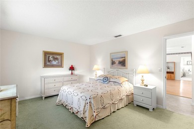 Welcome home to this immaculately maintained and sparkling clean on The Links of Spruce Creek in Florida - for sale on GolfHomes.com, golf home, golf lot