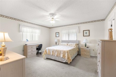 Welcome home to this immaculately maintained and sparkling clean on The Links of Spruce Creek in Florida - for sale on GolfHomes.com, golf home, golf lot