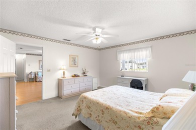 Welcome home to this immaculately maintained and sparkling clean on The Links of Spruce Creek in Florida - for sale on GolfHomes.com, golf home, golf lot