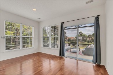 Enjoy Fabulous lagoon views from your large covered screen on Hidden Cypress Golf Club in South Carolina - for sale on GolfHomes.com, golf home, golf lot