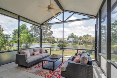 Enjoy Fabulous lagoon views from your large covered screen on Hidden Cypress Golf Club in South Carolina - for sale on GolfHomes.com, golf home, golf lot