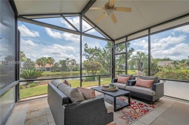 Enjoy Fabulous lagoon views from your large covered screen on Hidden Cypress Golf Club in South Carolina - for sale on GolfHomes.com, golf home, golf lot
