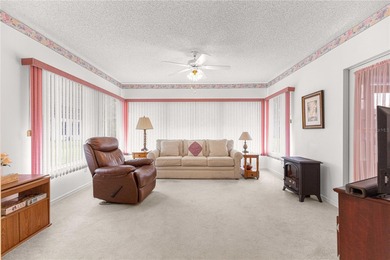 Welcome home to this immaculately maintained and sparkling clean on The Links of Spruce Creek in Florida - for sale on GolfHomes.com, golf home, golf lot